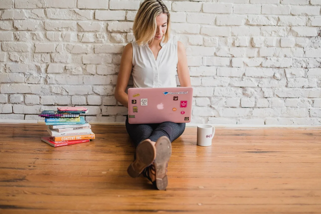 influencer, writing, girl, woman, typing, on computer, content marketing, typing on floor, written, words, handwriting, brown computer, brown laptop, brown marketing, brown writing, influencer, influencer, influencer, influencer, writing, writing, writing, writing, writing, typing, content marketing. Content marketing career path: five mid-career tracks